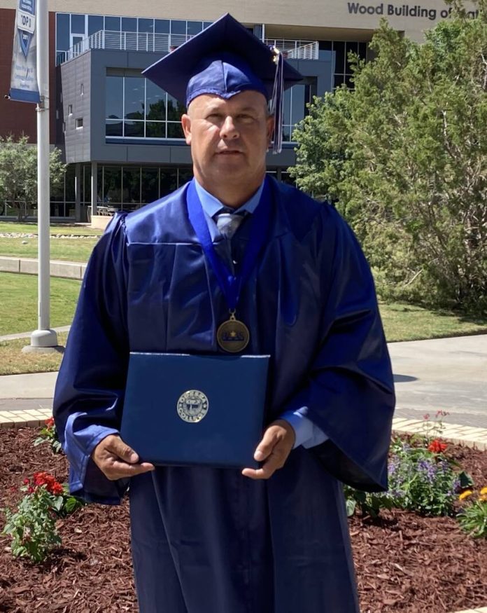 Ruth Campbell/Odessa American Lionel Baiza will graduate with a BAAS degree from Odessa College today. He is the first in his family to go to college.